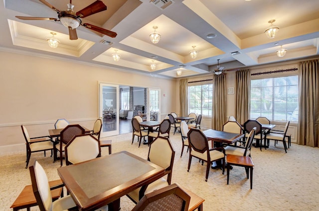 carpeted dining room with beamed ceiling, ornamental molding, ceiling fan, and coffered ceiling