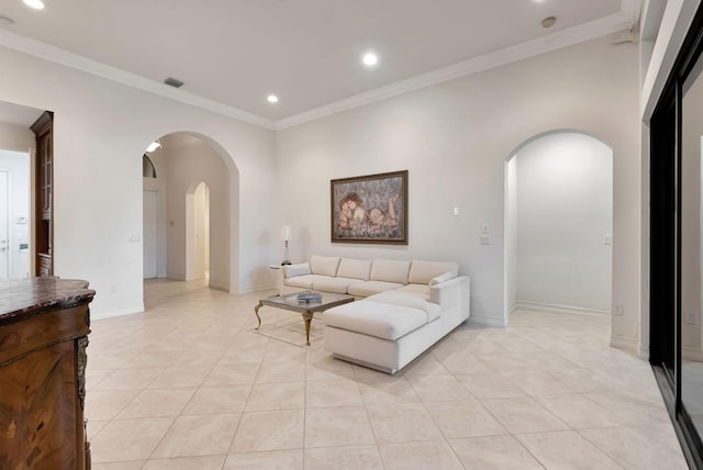 tiled living room featuring crown molding