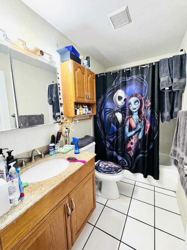 full bathroom featuring decorative backsplash, vanity, shower / bathtub combination with curtain, tile patterned flooring, and toilet