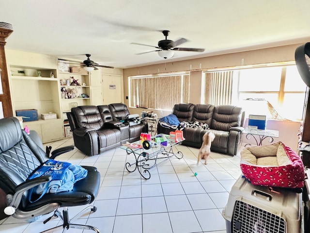 tiled living room with ceiling fan