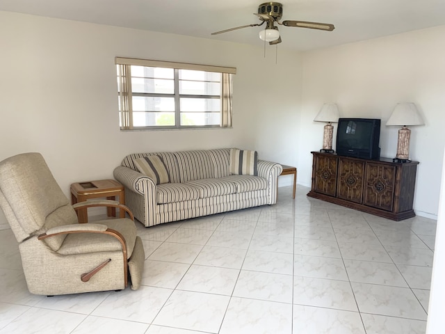 living room featuring ceiling fan