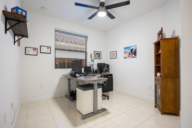 tiled home office with ceiling fan