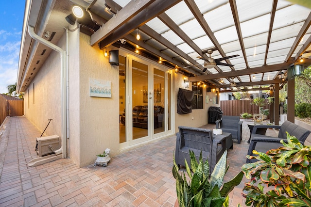 view of patio / terrace featuring a grill, an outdoor hangout area, and a pergola