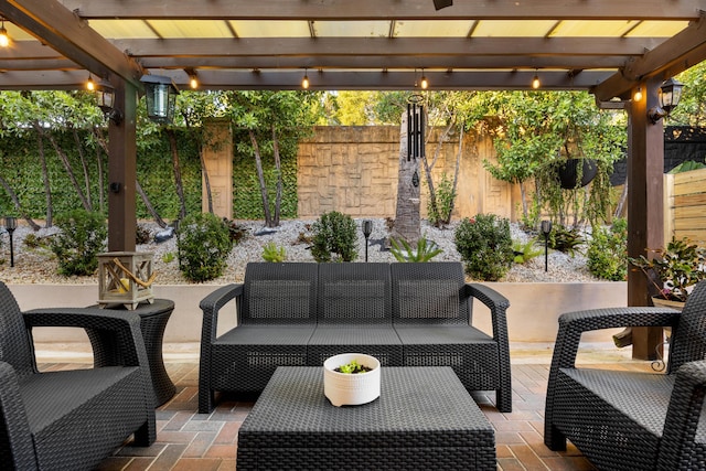 view of patio with an outdoor living space and a pergola