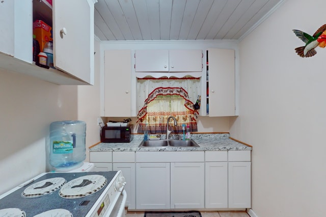 kitchen featuring white cabinets, white range with electric stovetop, ornamental molding, and sink