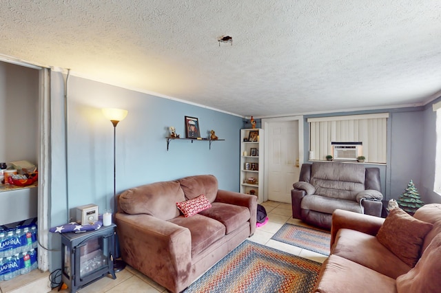 living room featuring light tile patterned floors and a textured ceiling