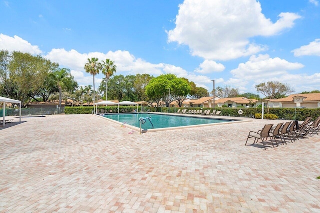 view of swimming pool featuring a patio