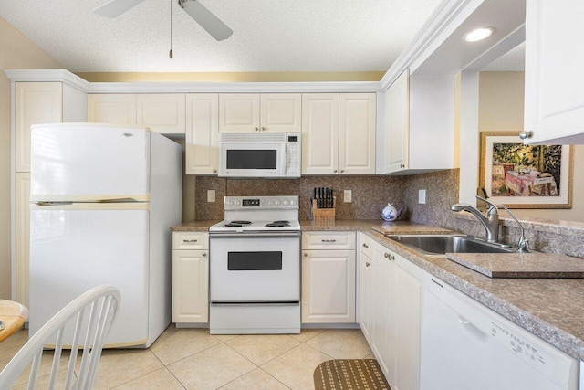 kitchen with a textured ceiling, white cabinetry, ceiling fan, and white appliances