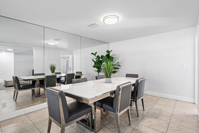 view of tiled dining space