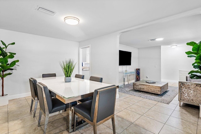 view of tiled dining space