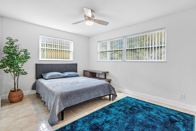 bedroom featuring ceiling fan