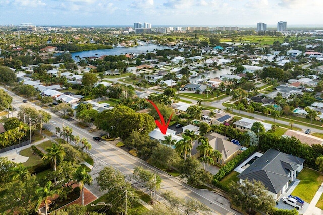 drone / aerial view featuring a water view