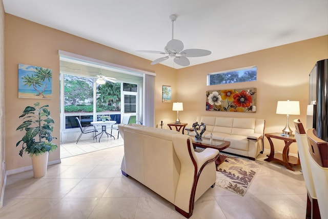 living room featuring ceiling fan and light tile patterned flooring