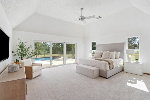 carpeted bedroom with access to exterior, ceiling fan, high vaulted ceiling, and multiple windows