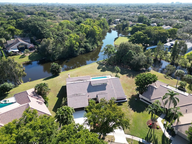 drone / aerial view with a water view