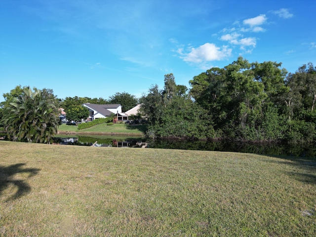 view of yard with a water view