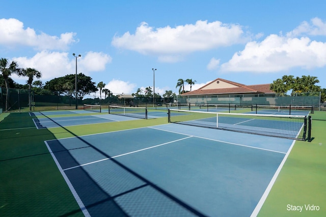 view of sport court featuring basketball hoop