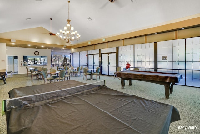 rec room with carpet, high vaulted ceiling, billiards, and an inviting chandelier