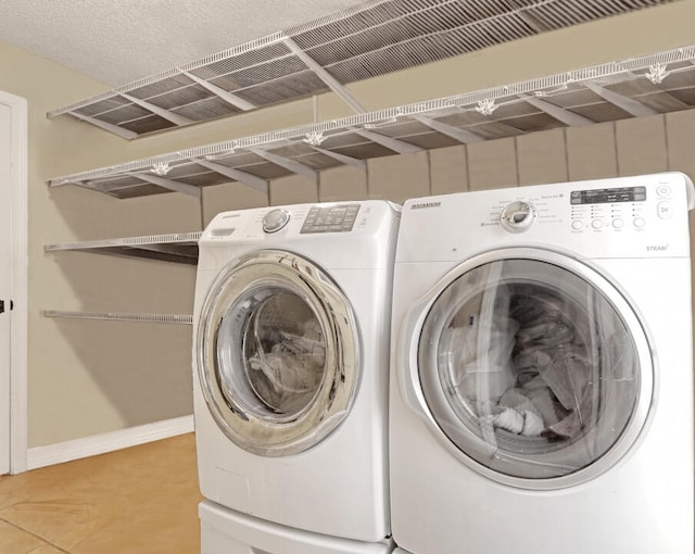 laundry room featuring washer and dryer