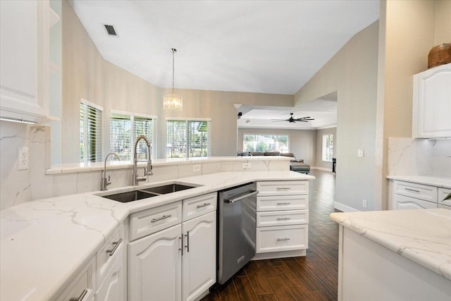 kitchen featuring dark hardwood / wood-style flooring, sink, white cabinets, and stainless steel dishwasher