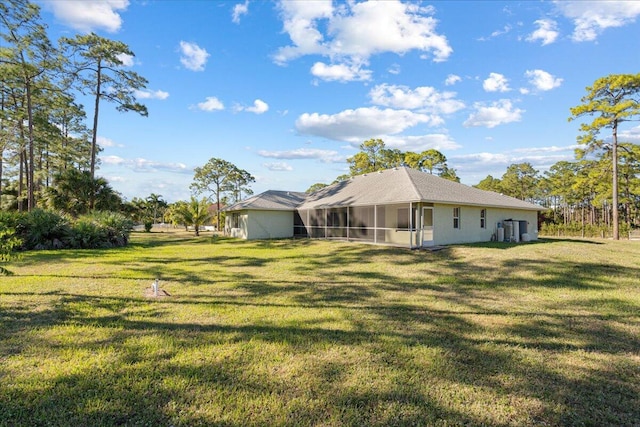 view of yard with a sunroom