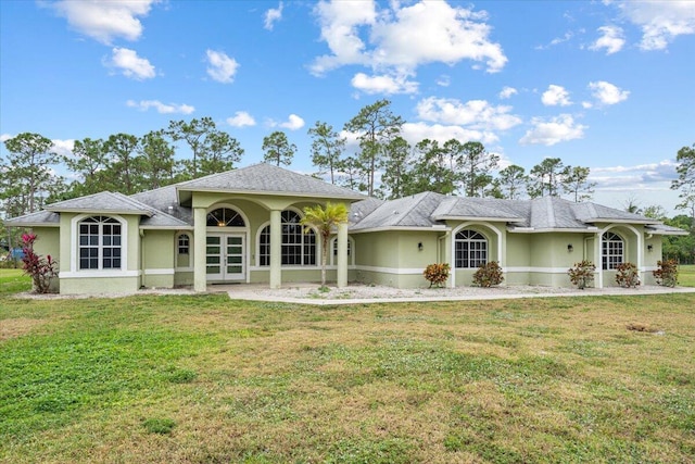 view of front of home with a front lawn