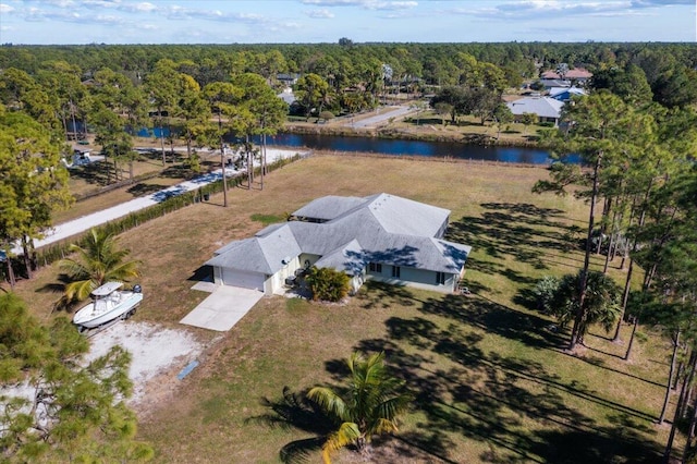 drone / aerial view with a water view