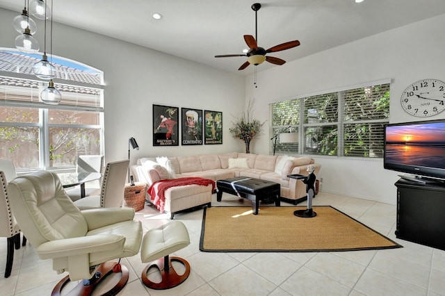 tiled living room featuring ceiling fan