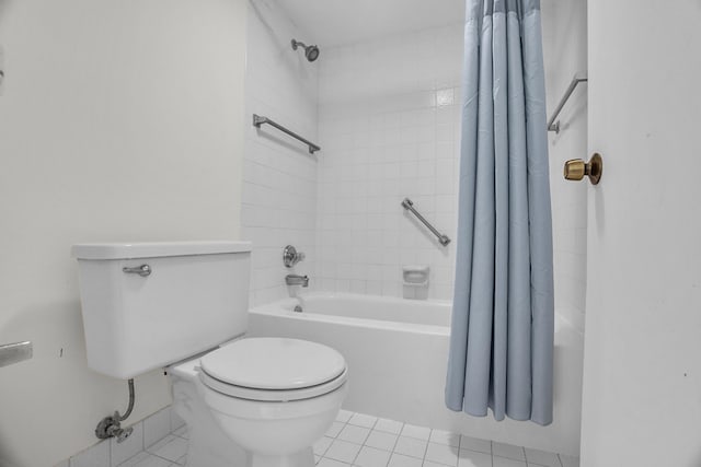 bathroom featuring toilet, tile patterned flooring, and shower / bathtub combination with curtain