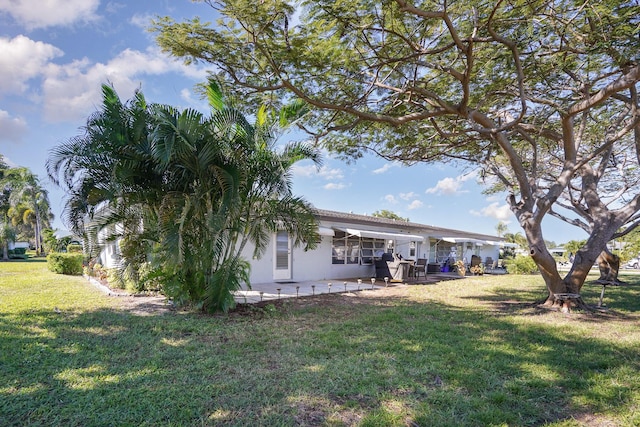 exterior space with a yard and a patio