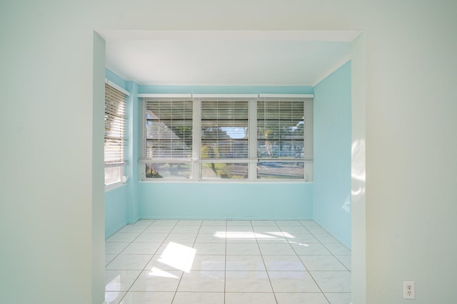 spare room with light tile patterned flooring