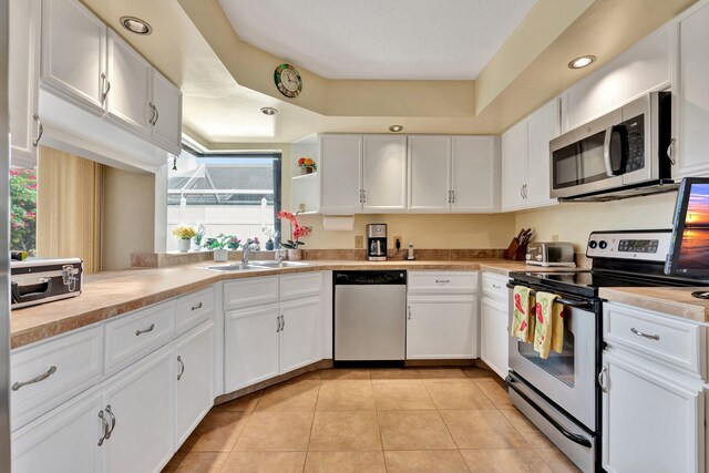 kitchen with white cabinets and stainless steel appliances