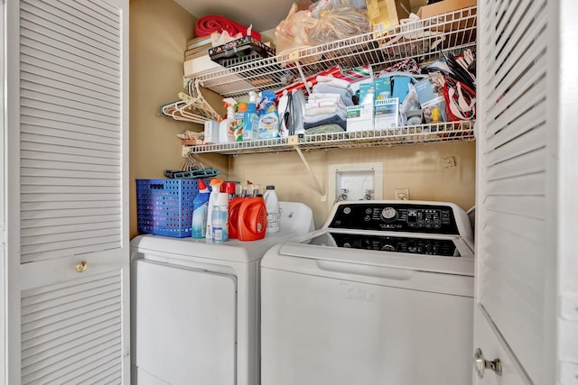 laundry area with separate washer and dryer