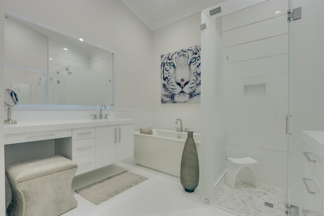 bathroom featuring vanity, ornamental molding, and shower with separate bathtub