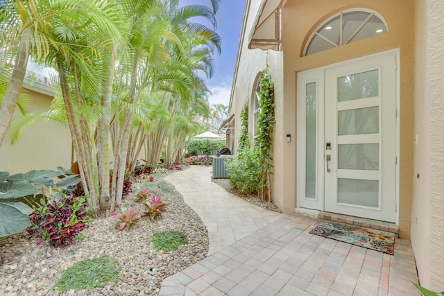 property entrance featuring cooling unit