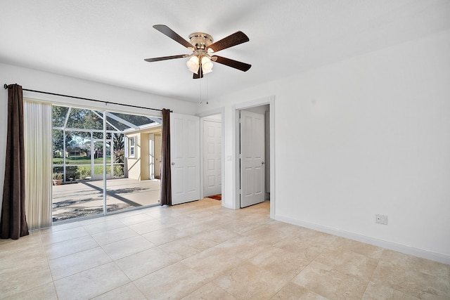 spare room featuring ceiling fan