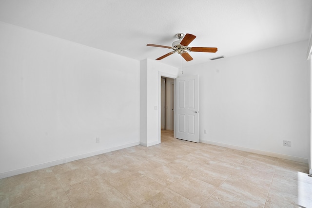 empty room featuring ceiling fan