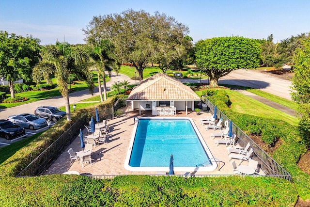 view of swimming pool with a patio area