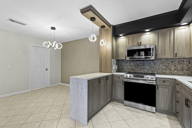 kitchen featuring light tile patterned floors, visible vents, decorative backsplash, appliances with stainless steel finishes, and a peninsula