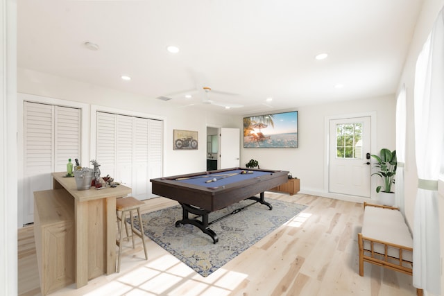 rec room with ceiling fan, light wood-type flooring, and pool table