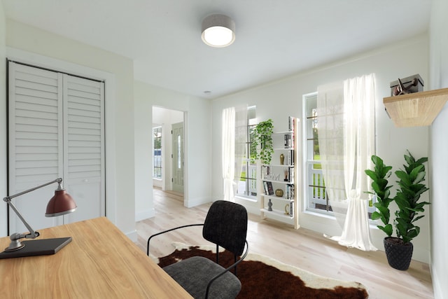 office space with light wood-type flooring