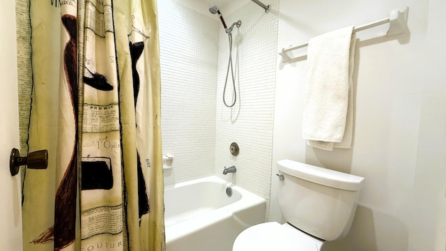 bathroom featuring toilet and shower / tub combo with curtain