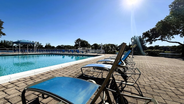 3650 Inverrary Dr Unit 3C, Lauderhill, FL 33319 - community pool featuring a patio area