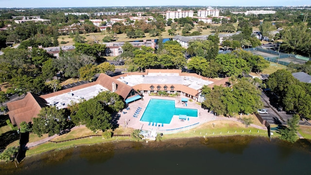 birds eye view of property with a water view