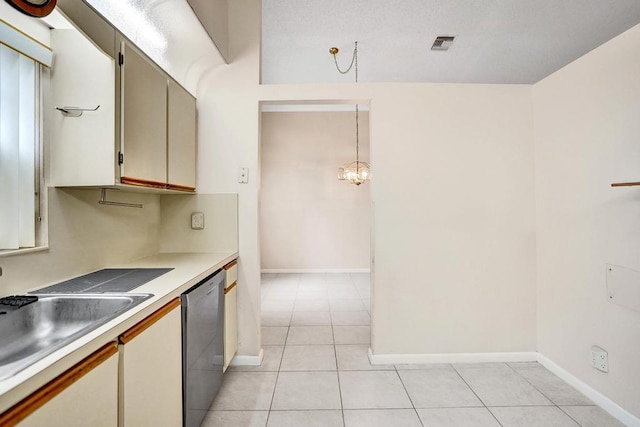 kitchen featuring sink, decorative light fixtures, a notable chandelier, dishwasher, and light tile patterned flooring