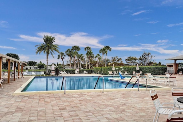 view of swimming pool featuring a patio