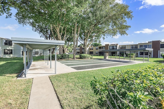 view of community with a yard