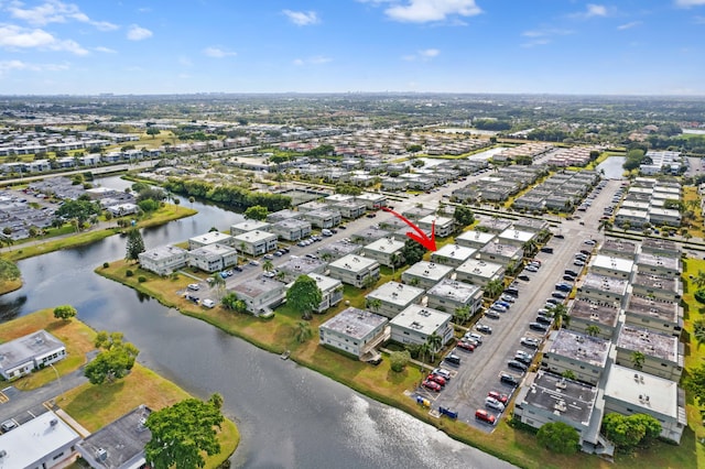 drone / aerial view featuring a water view