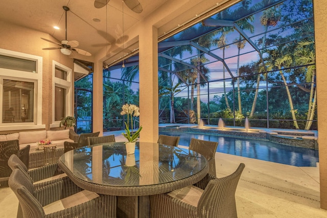 interior space with ceiling fan