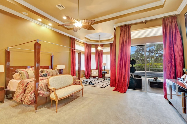 bedroom with access to exterior, a tray ceiling, ceiling fan, and crown molding